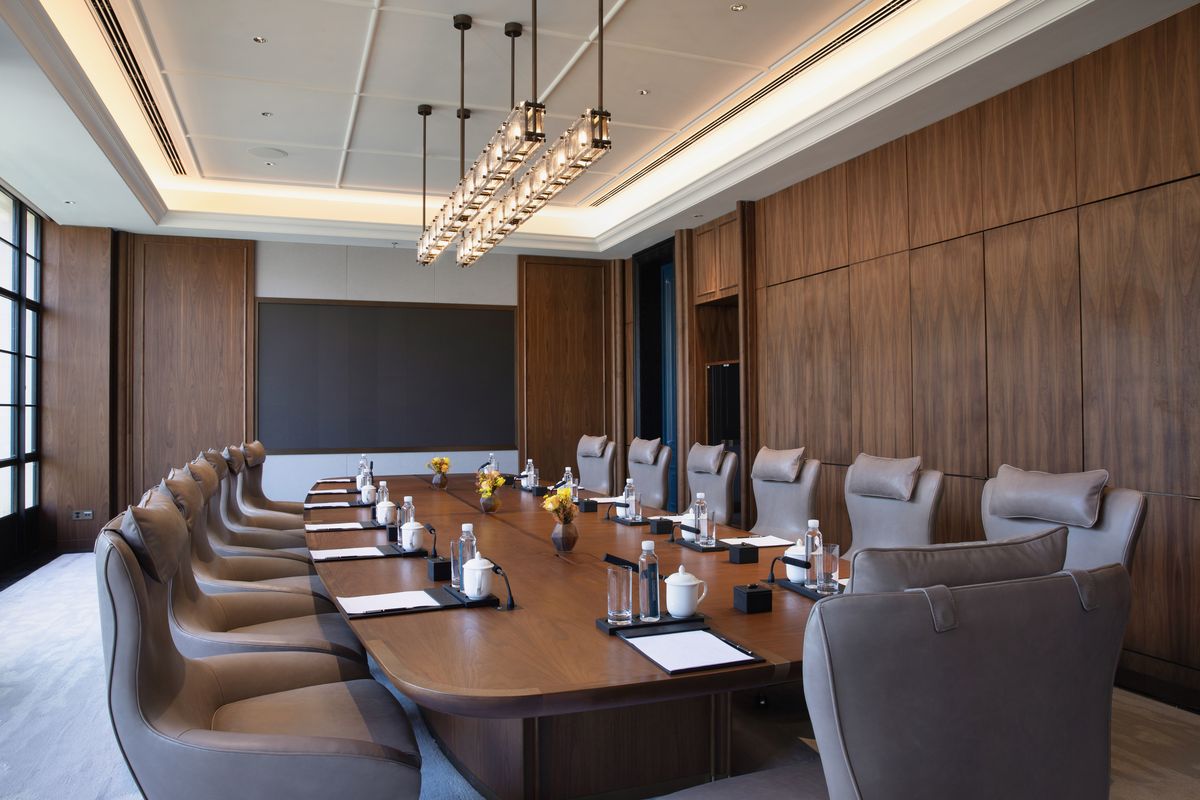Modern luxury boardroom with city views